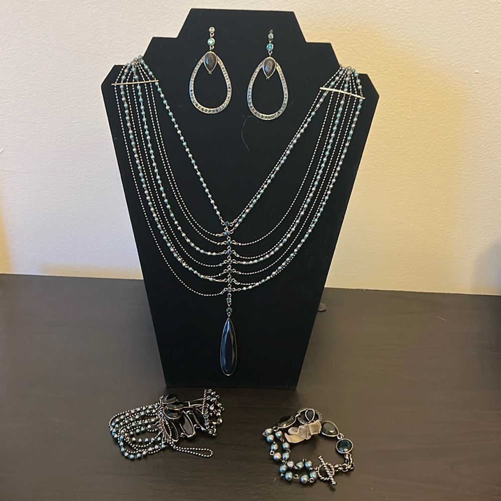 Faux emerald jewelry set with necklace, two bracelets and earrings